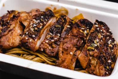Home Korean chicken with stir fried noodles chefiesta catering company Uk