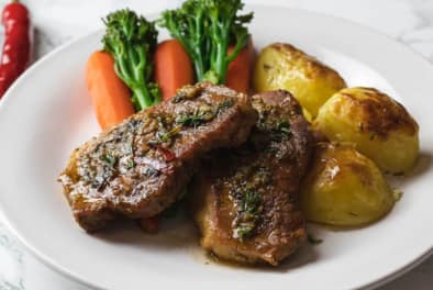 Home Pork Chops & Potatoes, carrots and broccoli Chefiesta Catering