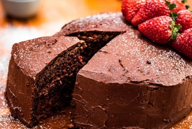 Home Chocolate cake and strawberries Chefiesta Catering