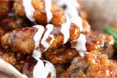 Home Wings with sauce chefiesta catering company
